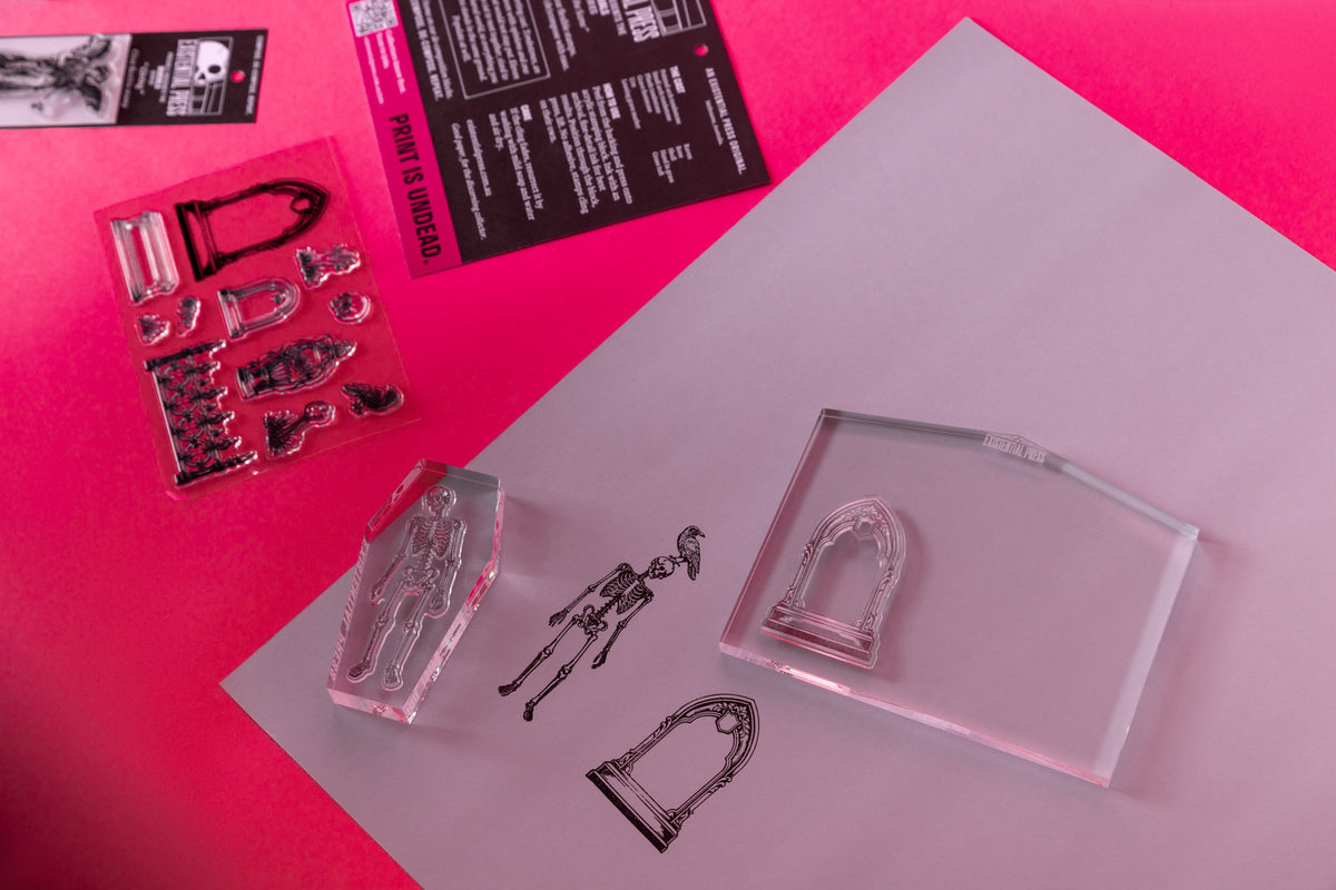 Restless skeleton clear stamp with tools on a pink background